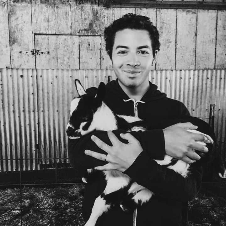 Sam with a goat